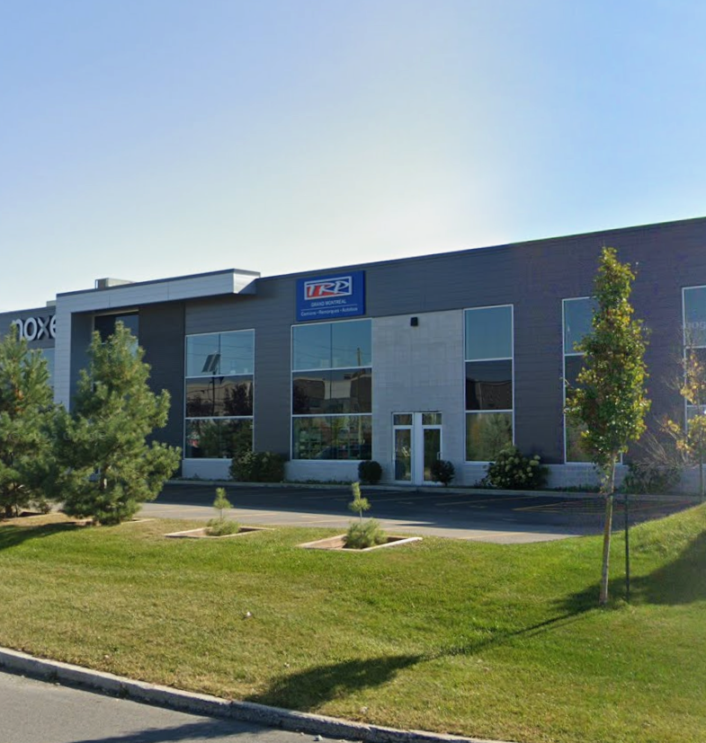Façade de la succursale TRP MASKA Saint-Eustache, spécialisée dans la vente de pièces pour camions lourds et remorques. Exterior of the TRP MASKA Saint-Eustache location, specializing in parts for heavy-duty trucks and trailers.